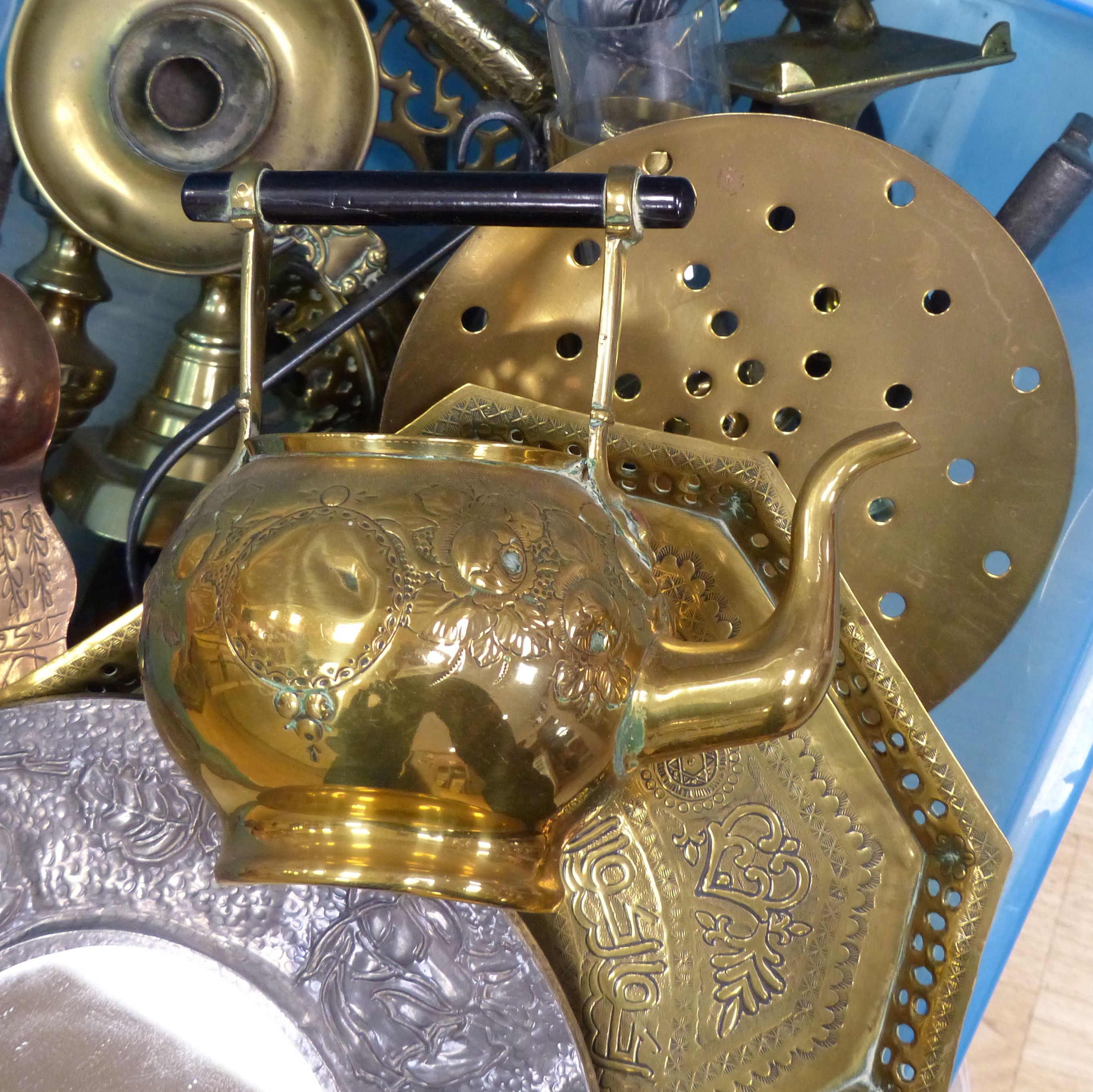 A quantity of copper and brassware, including a cream skimmer, a GWR railway carriage lamp, a large wrought iron key, etc.